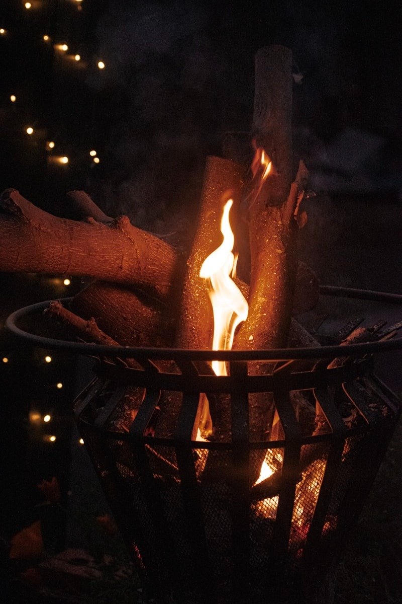 Wood firepits with burning logs